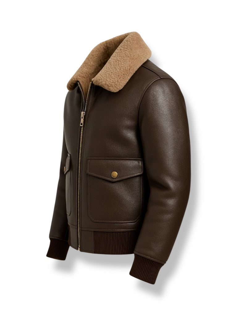 Brown shearling leather jacket with a tan shearling collar on a white background